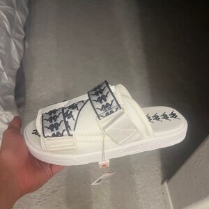Brand new never worn Kappa slides. Sz 10( can fit a 9-10)